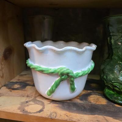 Large assortment of mostly ceramic garden pots, vases, with a new rain gauge and new Russco iii wind chime