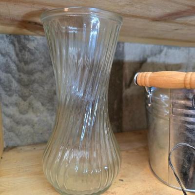 Large assortment of mostly ceramic garden pots, vases, with a new rain gauge and new Russco iii wind chime