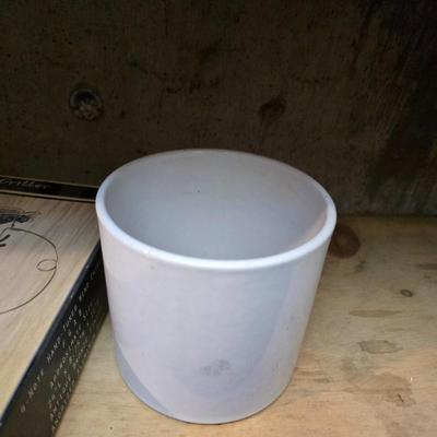 Large assortment of mostly ceramic garden pots, vases, with a new rain gauge and new Russco iii wind chime