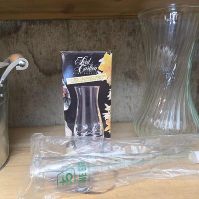 Large assortment of mostly ceramic garden pots, vases, with a new rain gauge and new Russco iii wind chime