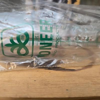 Large assortment of mostly ceramic garden pots, vases, with a new rain gauge and new Russco iii wind chime