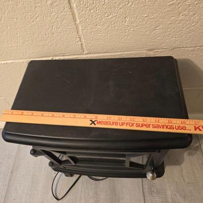 Working Space heater fireplace Model SF57C-17A00 with brown braided throw rug