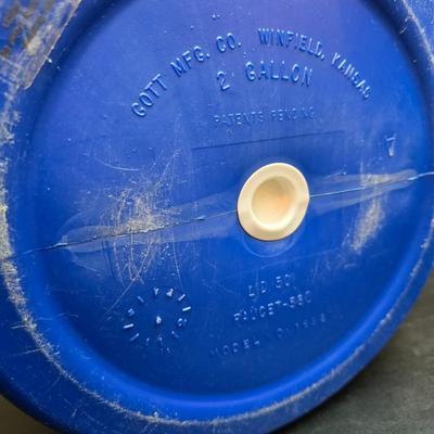Two vintage Gott water coolers - 2 Gallon metal galvanized water cooler and a 2-gallon Gott blue plastic cooler