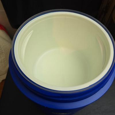 Two vintage Gott water coolers - 2 Gallon metal galvanized water cooler and a 2-gallon Gott blue plastic cooler