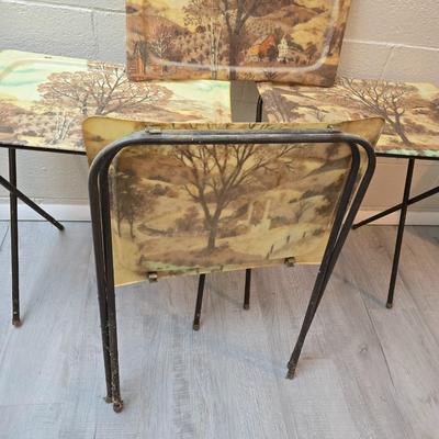 Vintage set of 3 complete fiberglass TV trays from the 1960s, featuring a rustic "Log Cabin" or country scene pattern likely...
