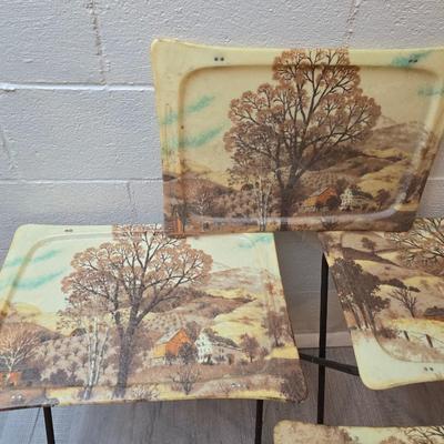 Vintage set of 3 complete fiberglass TV trays from the 1960s, featuring a rustic "Log Cabin" or country scene pattern likely...
