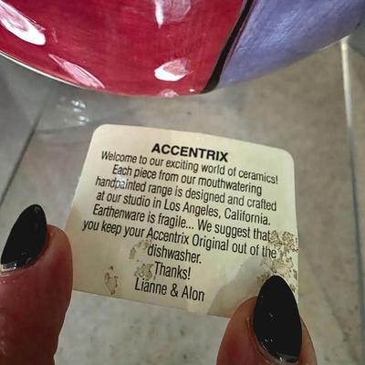 Sale Photo Thumbnail #80: Wildy vibrant contemporary ceramic art glass designed and crafted by artisans out of Accentrix studio in Los Angeles, CA. The vase measures 16"H x 10"W.