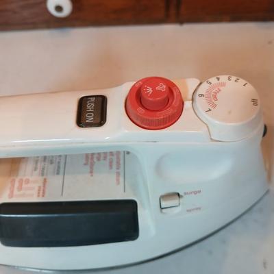 Time to do laundry!!Old metal Ironing board with hamper, laundry bag, Clothes iron, Lint brush and a Remington clothes dryer