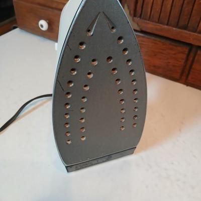 Time to do laundry!!Old metal Ironing board with hamper, laundry bag, Clothes iron, Lint brush and a Remington clothes dryer