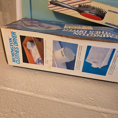 Time to do laundry!!Old metal Ironing board with hamper, laundry bag, Clothes iron, Lint brush and a Remington clothes dryer