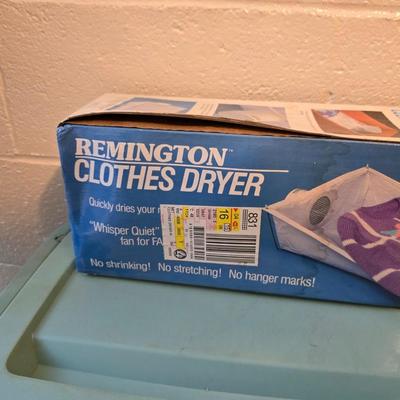 Time to do laundry!!Old metal Ironing board with hamper, laundry bag, Clothes iron, Lint brush and a Remington clothes dryer