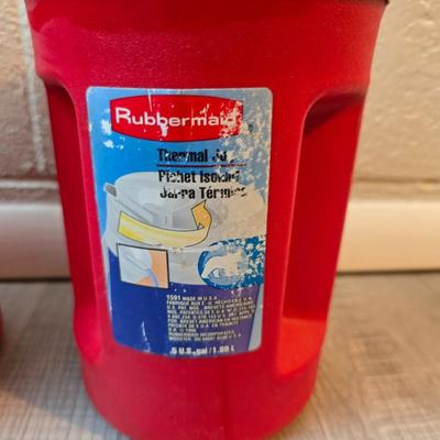 Craftsman storage tote, canvas Craftsman tool bag, red water coolers, and a 3 a day lunch cooler / bag