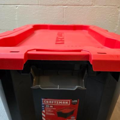 Craftsman storage tote, canvas Craftsman tool bag, red water coolers, and a 3 a day lunch cooler / bag