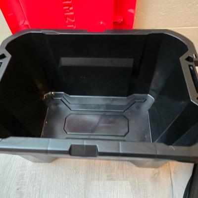 Craftsman storage tote, canvas Craftsman tool bag, red water coolers, and a 3 a day lunch cooler / bag