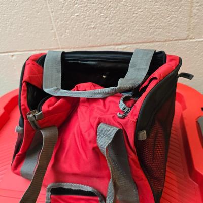 Craftsman storage tote, canvas Craftsman tool bag, red water coolers, and a 3 a day lunch cooler / bag