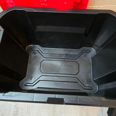 Craftsman storage tote, canvas Craftsman tool bag, red water coolers, and a 3 a day lunch cooler / bag