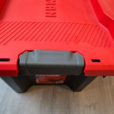 Craftsman storage tote, canvas Craftsman tool bag, red water coolers, and a 3 a day lunch cooler / bag