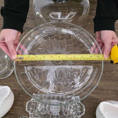 Sale Photo Thumbnail #94: This is a lot including a glass cake stand with dome, glass butter dish, crystal salt and pepper shakers, glass tea pitcher, crystal bud vase, 2 white gravy bowls and 10 grapefruit spoons. These are mostly all unmarked items. You are bidding on the lot me
