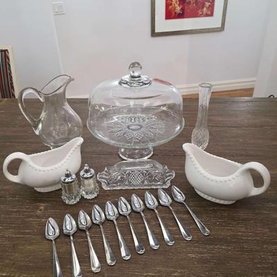 Sale Photo Thumbnail #89: This is a lot including a glass cake stand with dome, glass butter dish, crystal salt and pepper shakers, glass tea pitcher, crystal bud vase, 2 white gravy bowls and 10 grapefruit spoons. These are mostly all unmarked items. You are bidding on the lot me