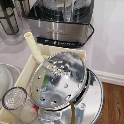 Sale Photo Thumbnail #99: This is a lot including a Keurig coffee maker, Cuisinart food processor, salad mixer, grinder, coffee cups and other miscellaneous items. You are bidding on the lot meaning you must pay for and take the entire lot.