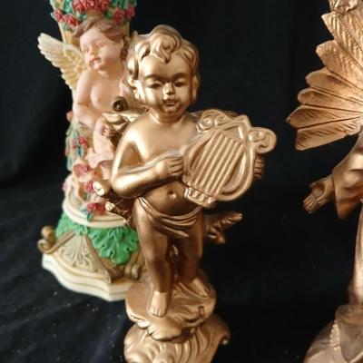 Matching Cherub angel candle sticks Victorian like, two Gregorian copper candles and two gold angel figures