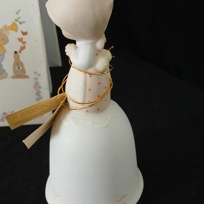 Precious moments figures with a precious moments photo album