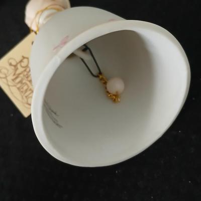 Precious moments figures with a precious moments photo album