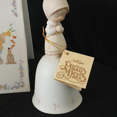 Precious moments figures with a precious moments photo album