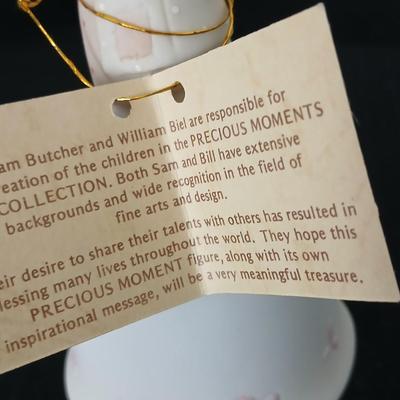 Precious moments figures with a precious moments photo album