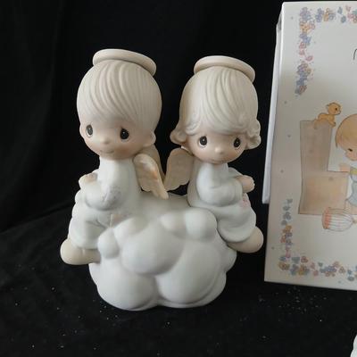 Precious moments figures with a precious moments photo album