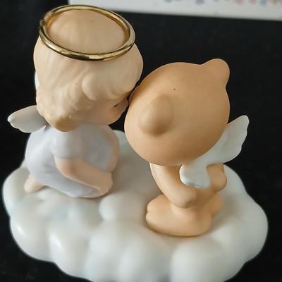 Precious moments figures with a precious moments photo album