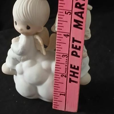 Precious moments figures with a precious moments photo album