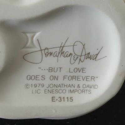 Precious moments figures with a precious moments photo album