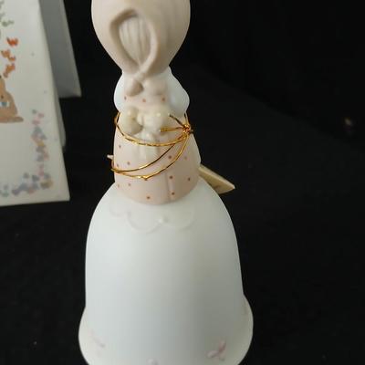 Precious moments figures with a precious moments photo album