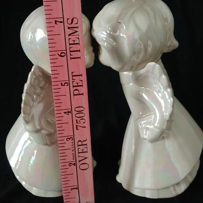 Twe sets of ceramic kissing angels
