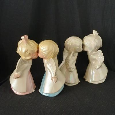 Twe sets of ceramic kissing angels