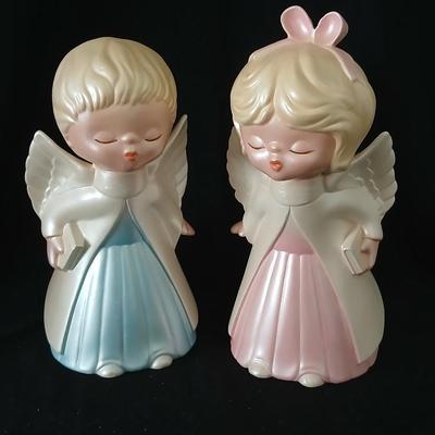 Twe sets of ceramic kissing angels