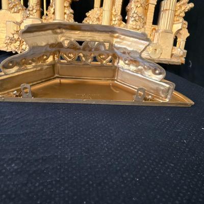 Two-Piece Homco Roman Ruins wall decor and a wall shelf