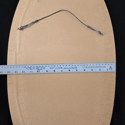 Large oval gold framed mirror with two matching /really close to matching gold decorative picture frames