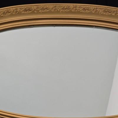 Large oval gold framed mirror with two matching /really close to matching gold decorative picture frames