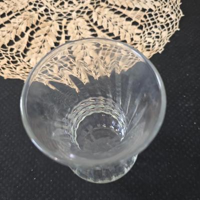 Elegant picture frame with collection of angels, and a large doily