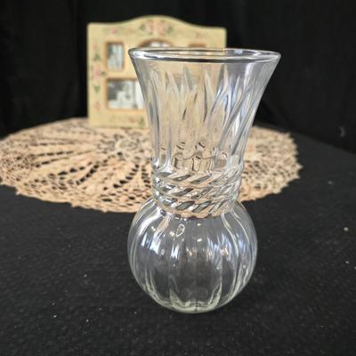 Elegant picture frame with collection of angels, and a large doily