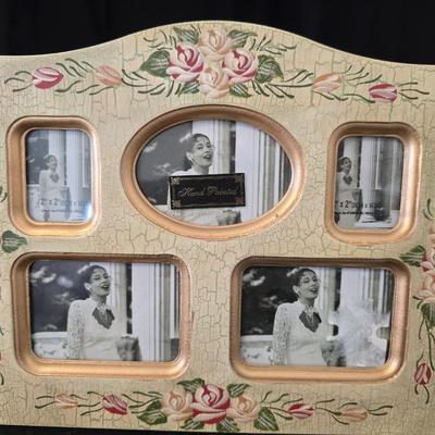 Elegant picture frame with collection of angels, and a large doily