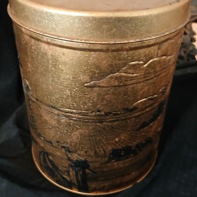 3D wall art plaque by Coppercraft Guild, titled "Traveler's Rest". with two vintage black and bronze / gold lacquer tins