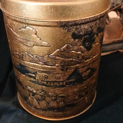 3D wall art plaque by Coppercraft Guild, titled "Traveler's Rest". with two vintage black and bronze / gold lacquer tins