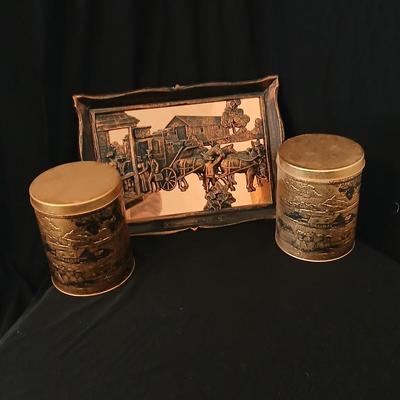 3D wall art plaque by Coppercraft Guild, titled "Traveler's Rest". with two vintage black and bronze / gold lacquer tins