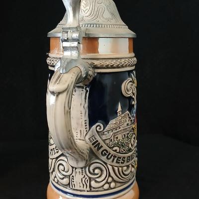 Two vintage German lidded porcelain beer steins - Gerz West Germany marked and Swiss Musical Mapsa