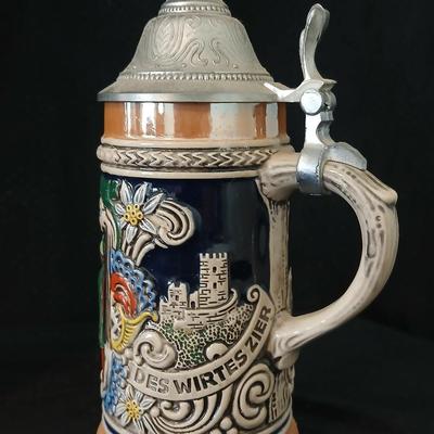 Two vintage German lidded porcelain beer steins - Gerz West Germany marked and Swiss Musical Mapsa