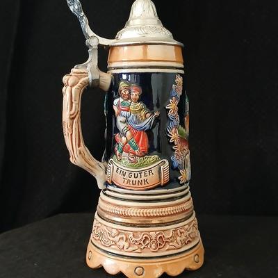 Two vintage German lidded porcelain beer steins - Gerz West Germany marked and Swiss Musical Mapsa