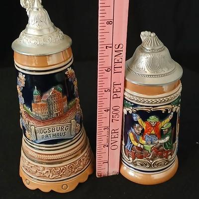 Two vintage German lidded porcelain beer steins - Gerz West Germany marked and Swiss Musical Mapsa